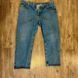 Wrangler blue jeans with a 30” inseam and 38” waist jeans. Like new condition.